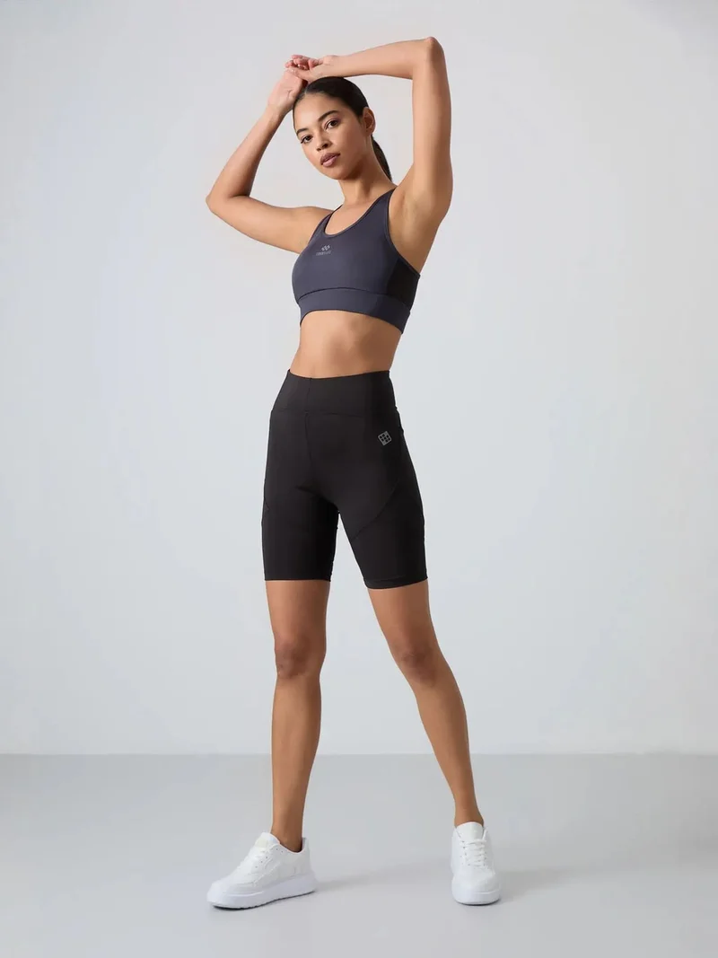 تومي لايف TOMMY Fitted Sleeveless Crop Sports Top