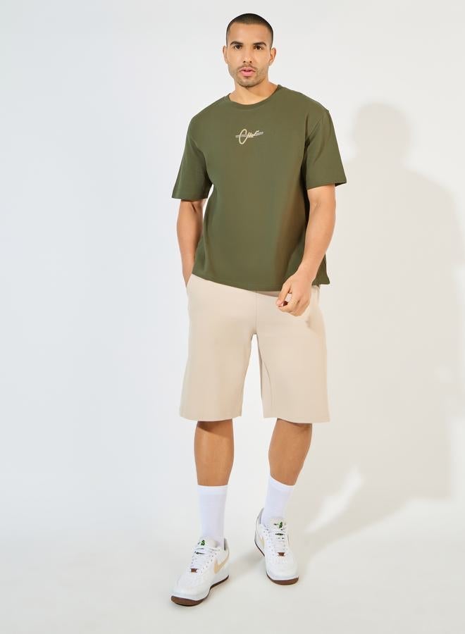 ستايلي تيشيرت تيري فضفاض مطبع بطبعات جرافيك - Image 2