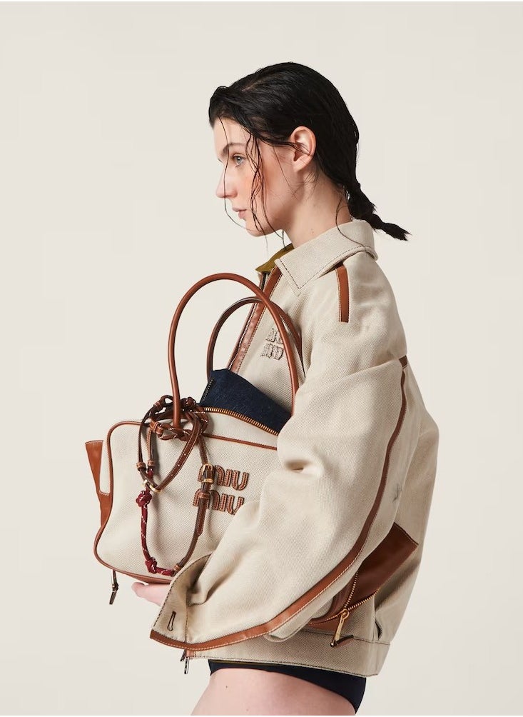 Miu Miu - miu Canvas top-handle bag - Image 1