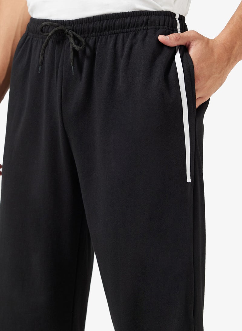 سفنتي فايف بيسيكس بنطلون رياضي فضفاض بخصر مطاطي وجانب مخطط - Image 4