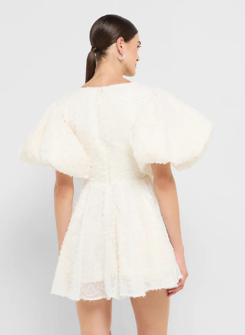 جينجر بوتيك eclat luxe puff sleeves baby ruffle skater dress