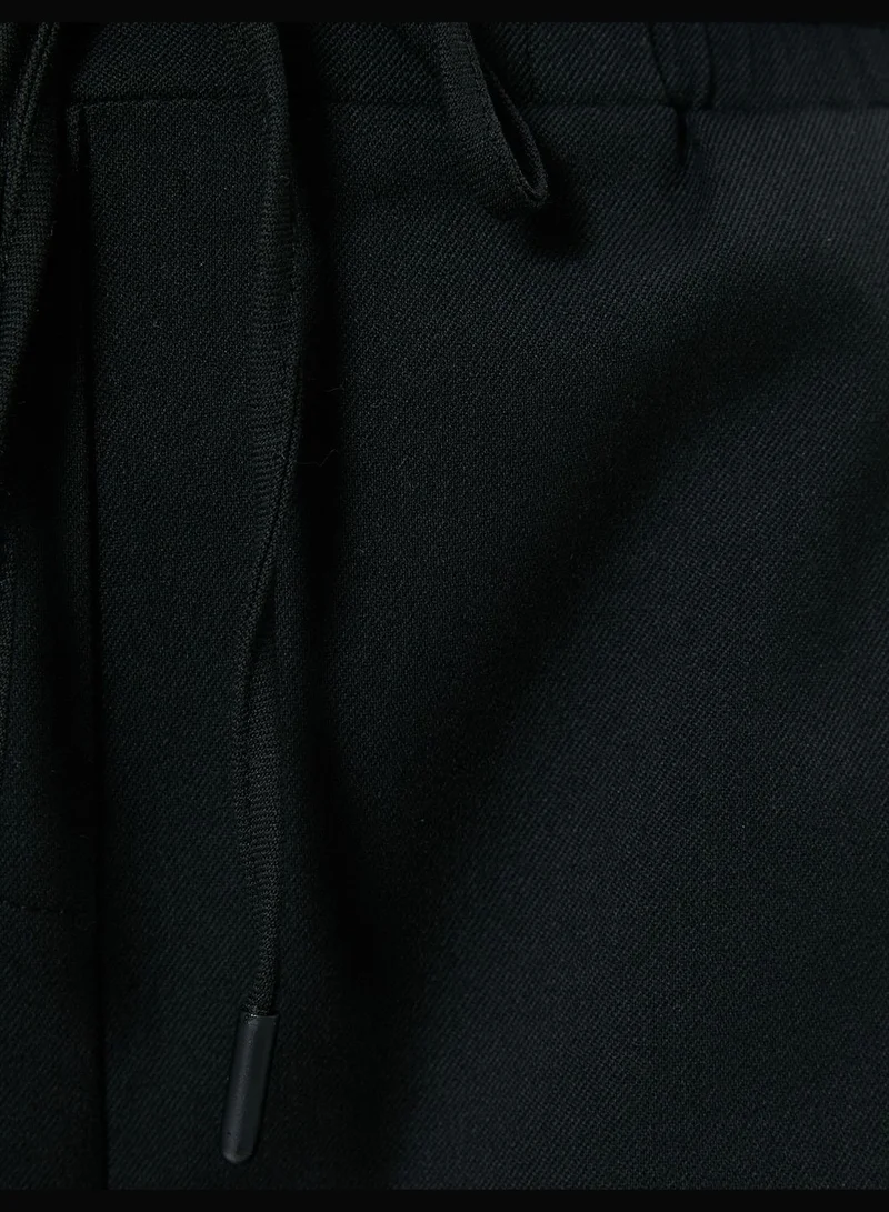 KOTON Pocket Detail Drawstring Carrot Pants