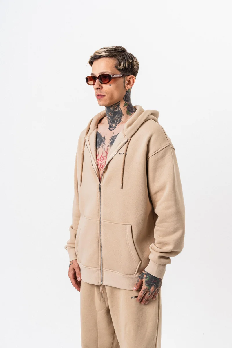 ريسباير هودي رجالي أساسي واسع (Oversize) بسحاب (Zip) بغطاء رأس بتفاصيل نص "Respire" لون بيج