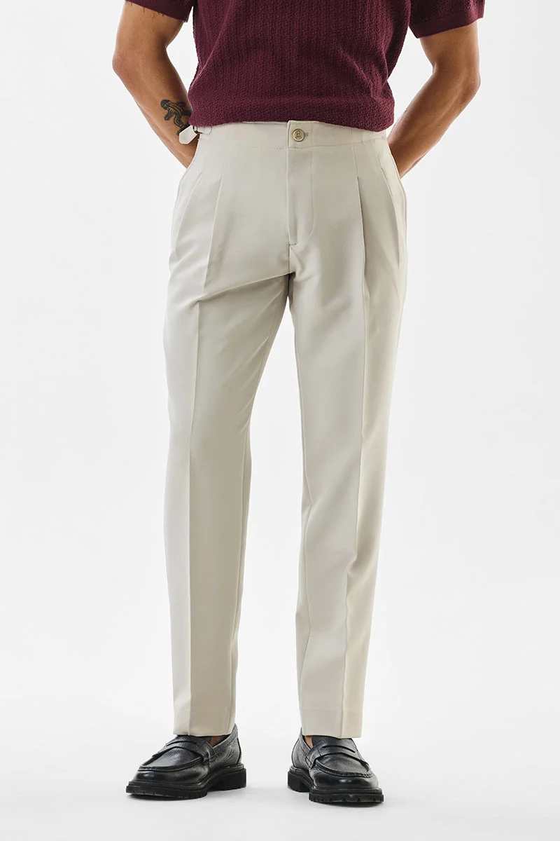 SNITCH بنطلون بيج بقصة ضيقة ومرونة