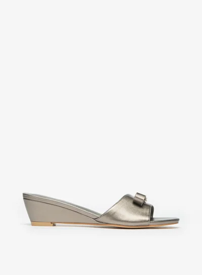 فلورا بيلا من شو إكسبرس Womens Logo Accented Slip On Sandals With Wedge Heels By Shoexpress