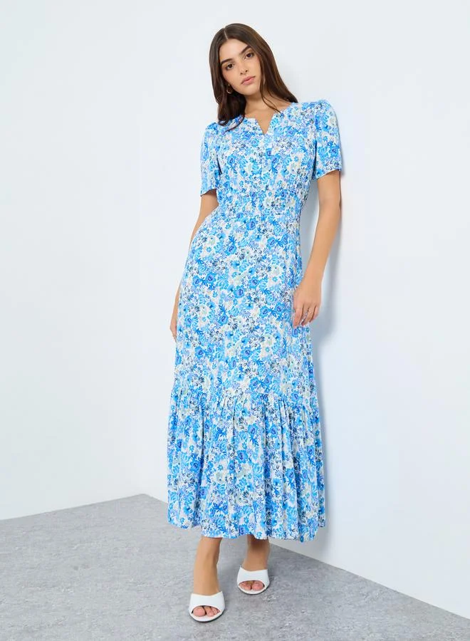 ستايلي فستان طويل بتفاصيل كسرات وطبعة زهور