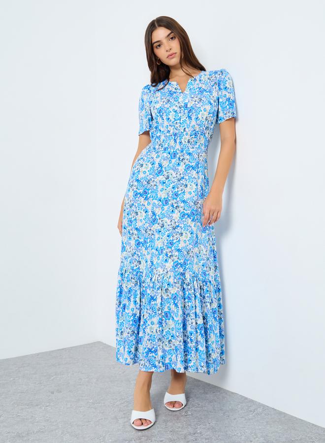 ستايلي فستان طويل بتفاصيل كسرات وطبعة زهور - Image 2