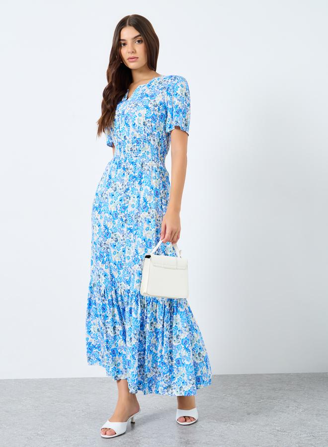 ستايلي فستان طويل بتفاصيل كسرات وطبعة زهور - Image 1