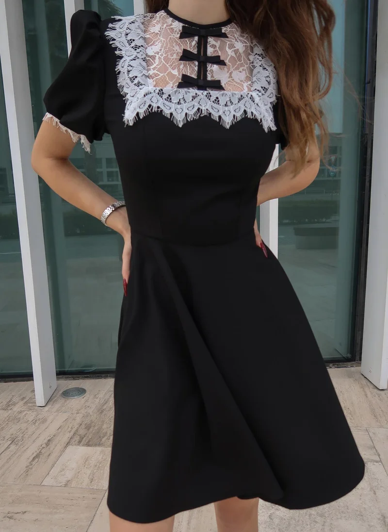 Mini dress with lace collar and cuffs