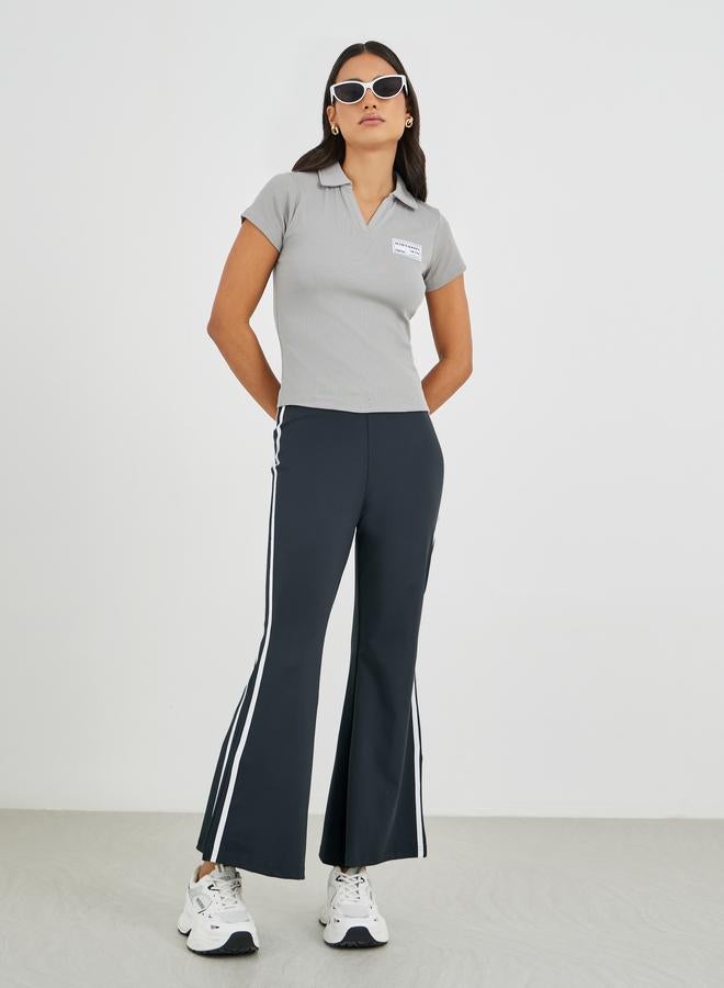 Styli Styli Fit and Flare Leggings with Side Stripes  - Image 1