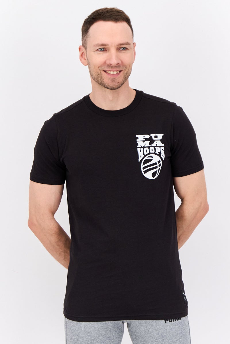 PUMA Men Sportswear Fit Short Sleeve Outdoor Hooper T-Shirt, Black/White - Image 1