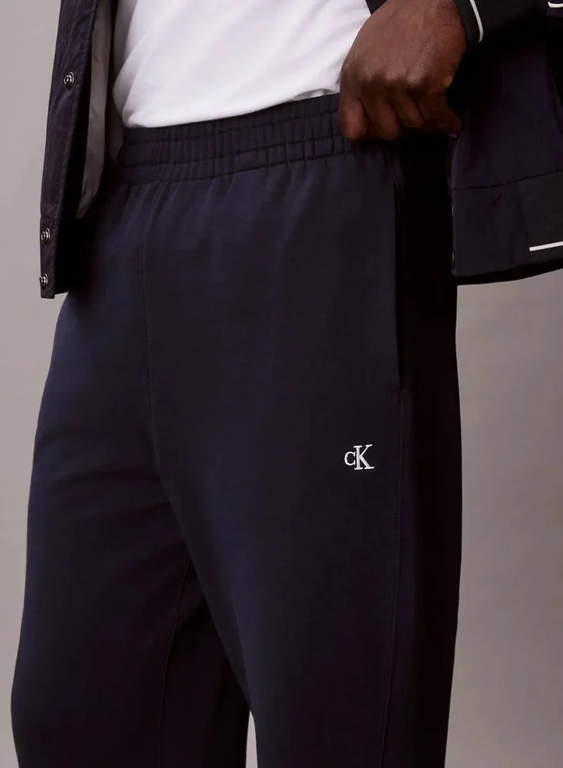 Calvin Klein Jeans Dark Sapphire Monogram French Terry Joggers for Men | Best Price UAE