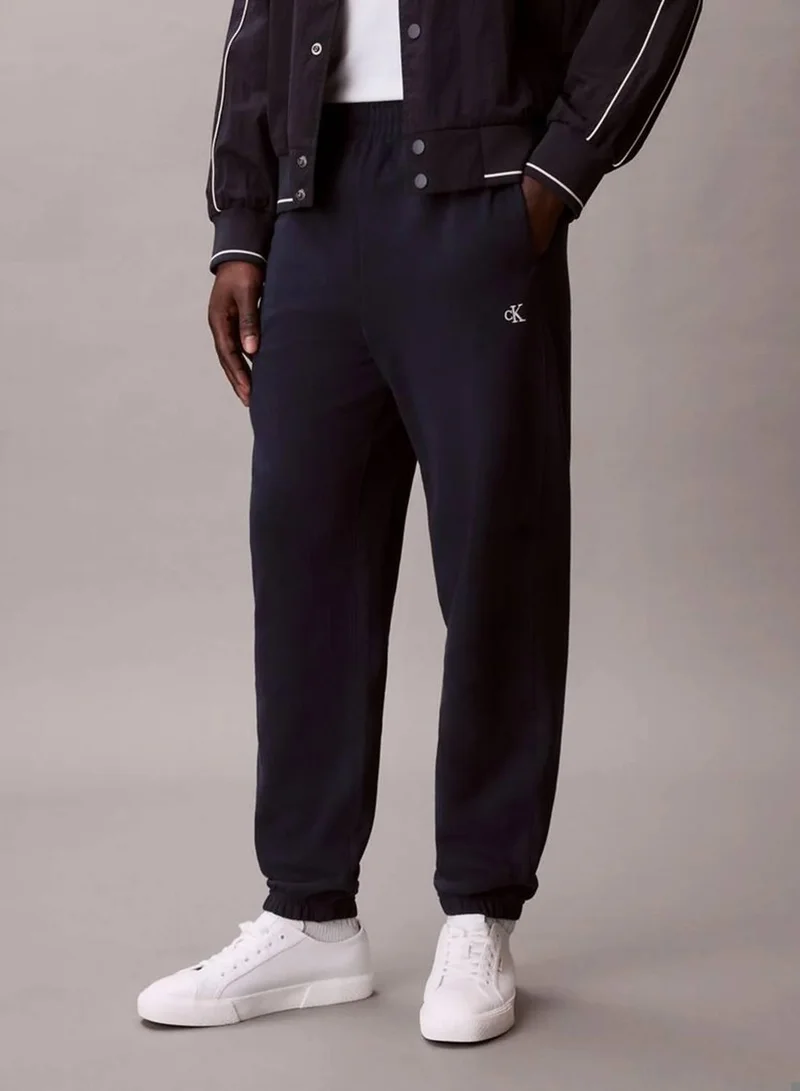 Calvin Klein Jeans Dark Sapphire Monogram French Terry Joggers for Men | Best Price UAE