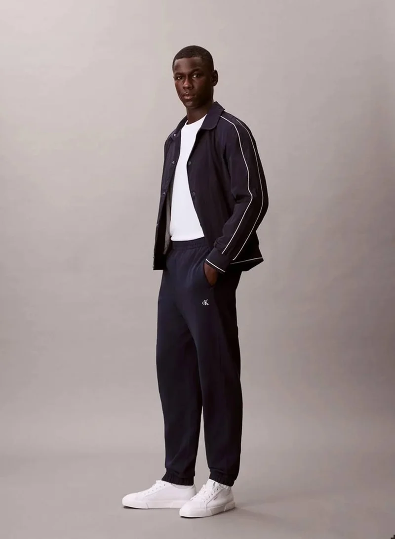 Calvin Klein Jeans Dark Sapphire Monogram French Terry Joggers for Men | Best Price UAE