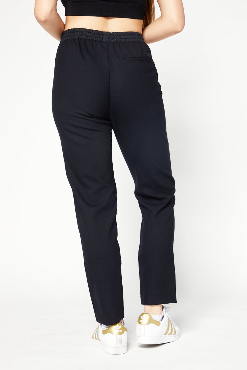 LACOSTE Women Sportswear Fit Solid Outdoor Track Pants, Black  - Image 3