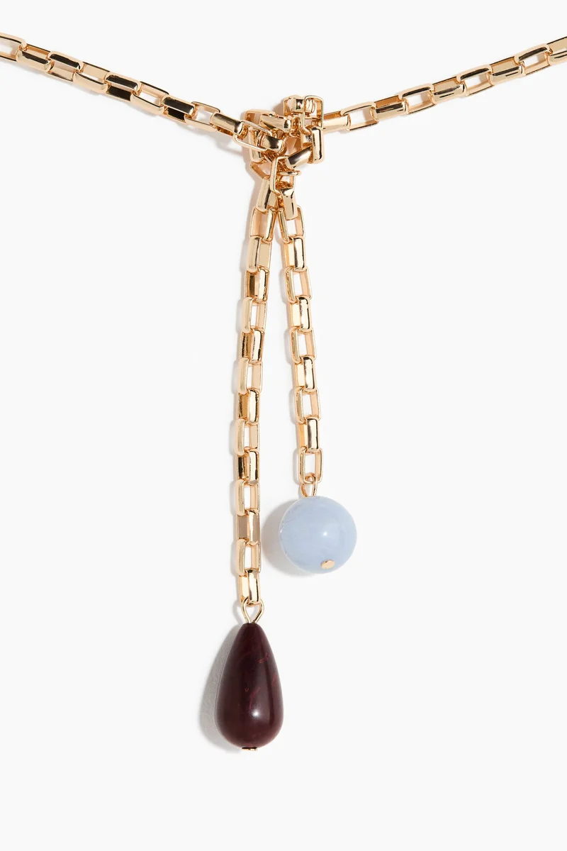 اتش اند ام قلادة بتفاصيل عقدة