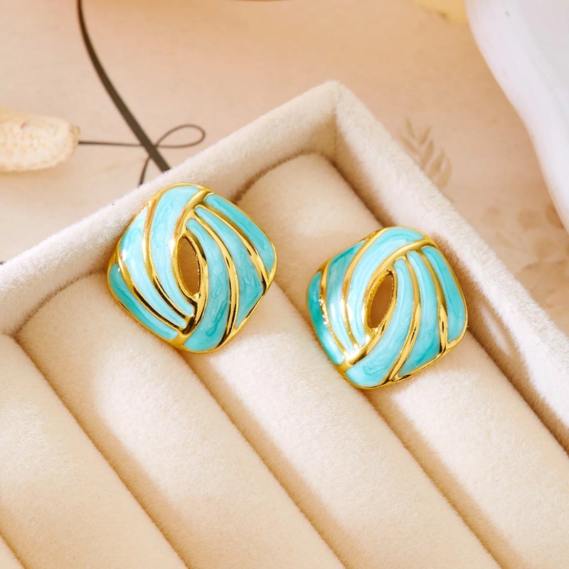 ذا بلاك بيرل اكسسوريز حلق أستانليس ستيل ذهبي × فيروزي - Image 1