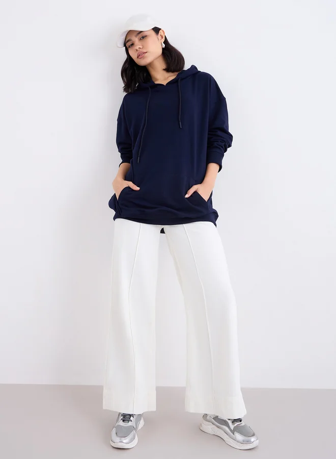 ستايلي هودي طويل واسع بطبعة جرافيك