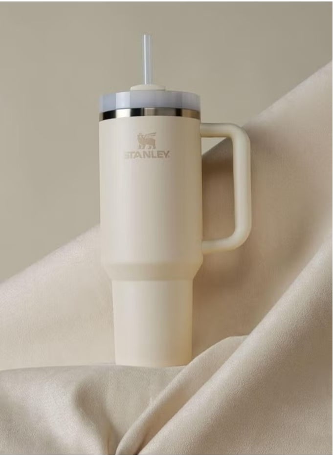Stanley - 40oz Quencher H2.0 FlowState Tumbler – Cream 2.0 – Large Vacuum Insulated Stainless Steel Travel Mug with Handle, Rotating Lid, and Reusable Straw – Keeps Drinks Cold for 11 Hours and Iced for 48 Hours – Dishwasher Safe Water Bottle - Image 1