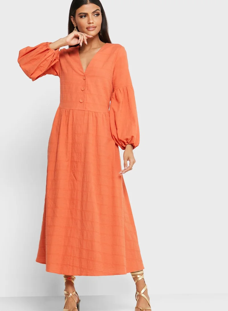 Khizana Puffed Sleeve Textured Midi Dress