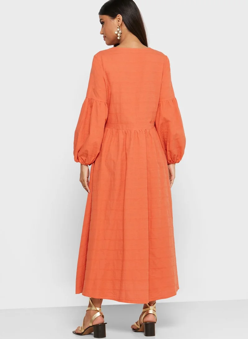 Khizana Puffed Sleeve Textured Midi Dress