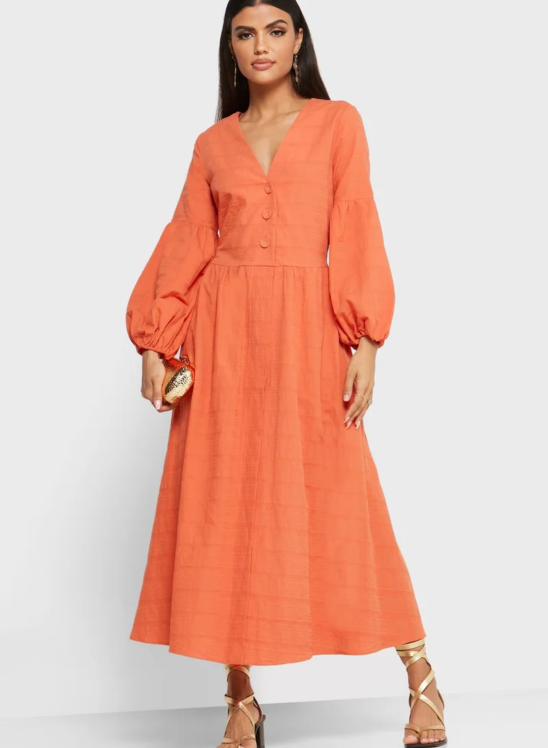 Khizana Puffed Sleeve Textured Midi Dress