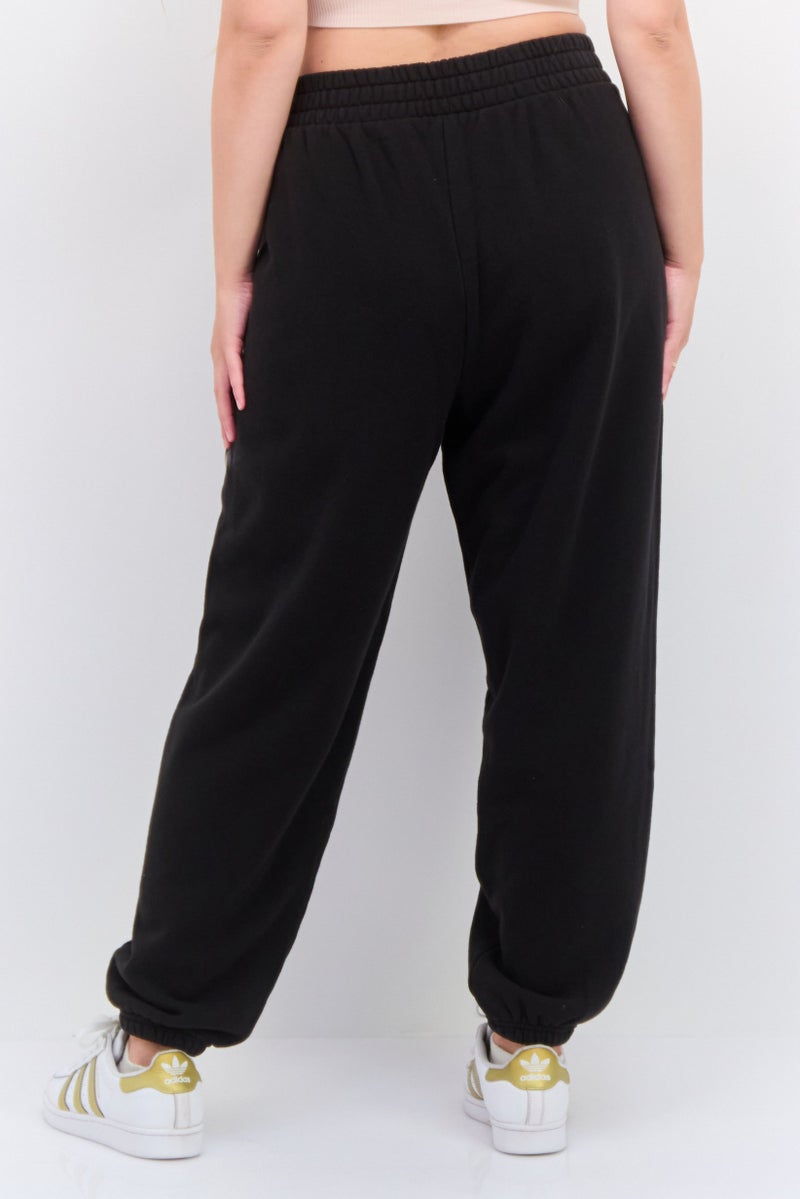 PUMA سروال رياضي خارجي مريح للنساء، أسود - Image 4