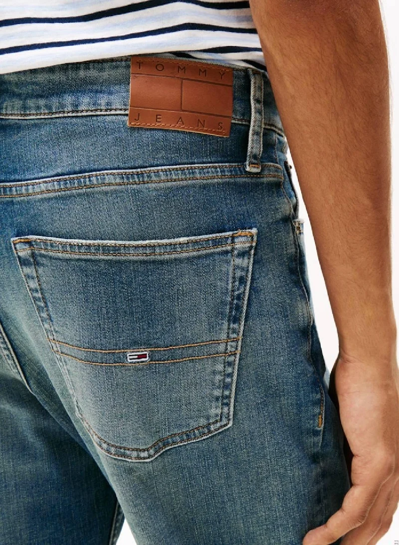 تومي جينز بنطال جينو بقصّة مستقيمة نحيفة بتأثير باهت