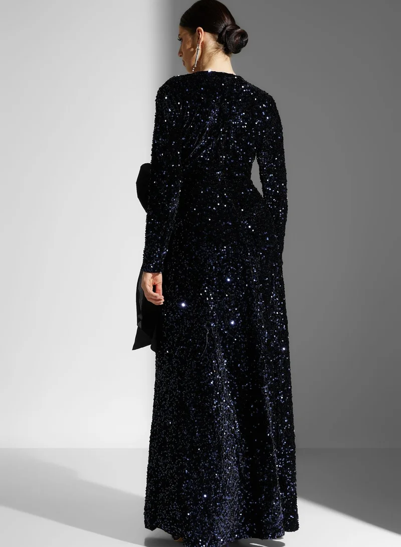 Namshi x Dana Shimmer Wrap Dress With Tie