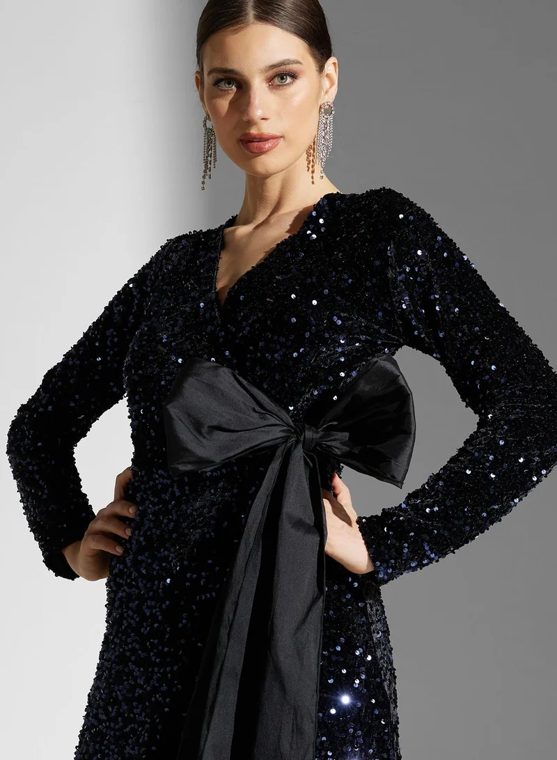 Namshi x Dana Shimmer Wrap Dress With Tie