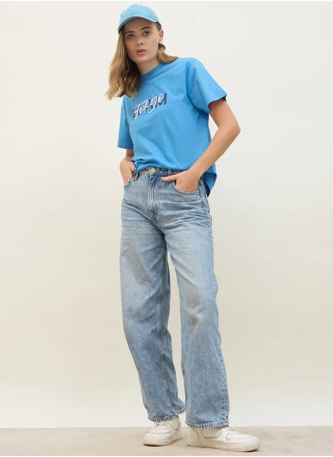 Styli Embroidered Slogan Boxy Fit Round Neck T-Shirt