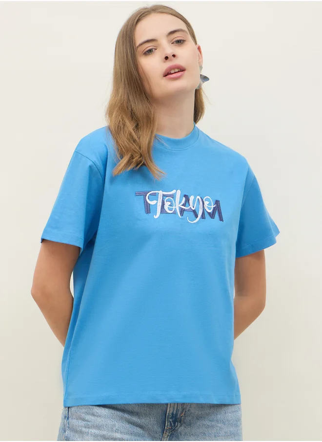 Styli Embroidered Slogan Boxy Fit Round Neck T-Shirt