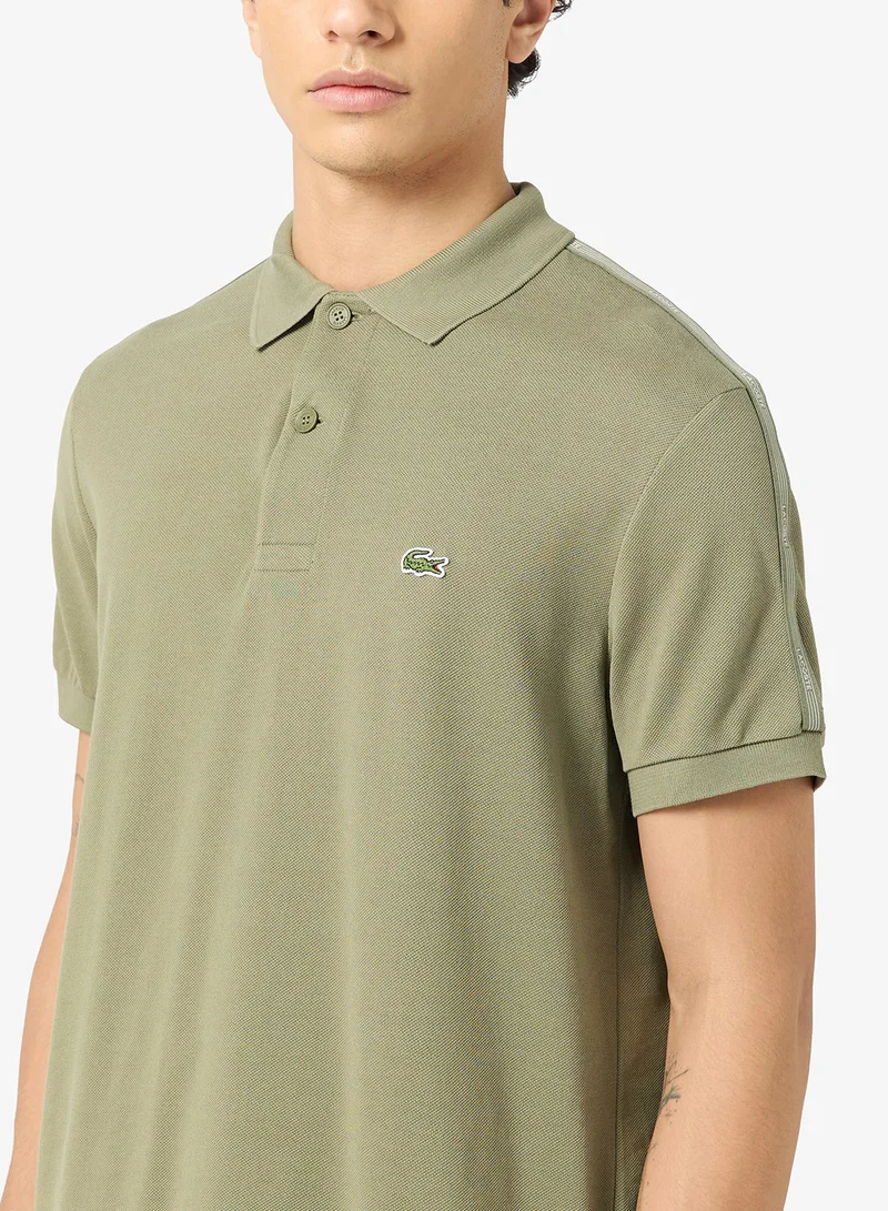 LACOSTE  Regular Fit Striped Band Piqué Polo for Men | Best Price UAE