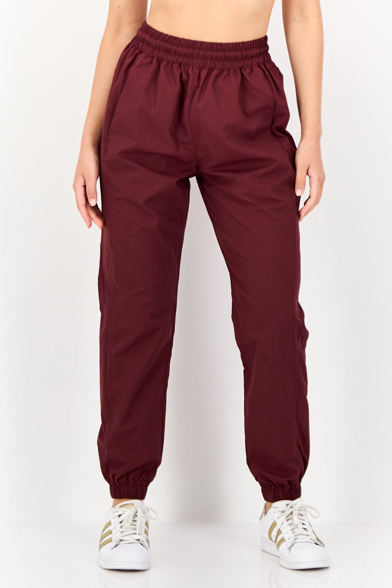 Reebok Women Sportswear Fit Outdoor Sweatpants, Maroon - Image 1
