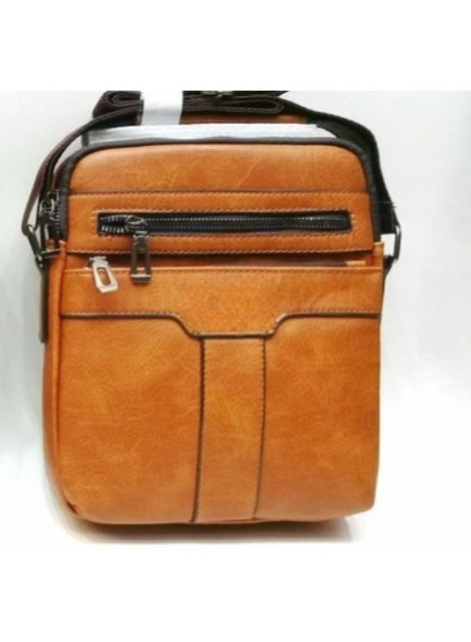 Luxury leather crossbody bag with multiple pockets and a front zipper. A practical shoulder bag for everyday essentials with a sophisticated casual design and an adjustable strap. 1-9306095 Havana - Image 3