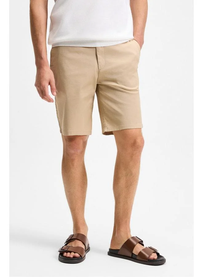 Grimelange TEEMO Men's Side Pocket Zippered Stretch Slim Fit Beige Shorts.