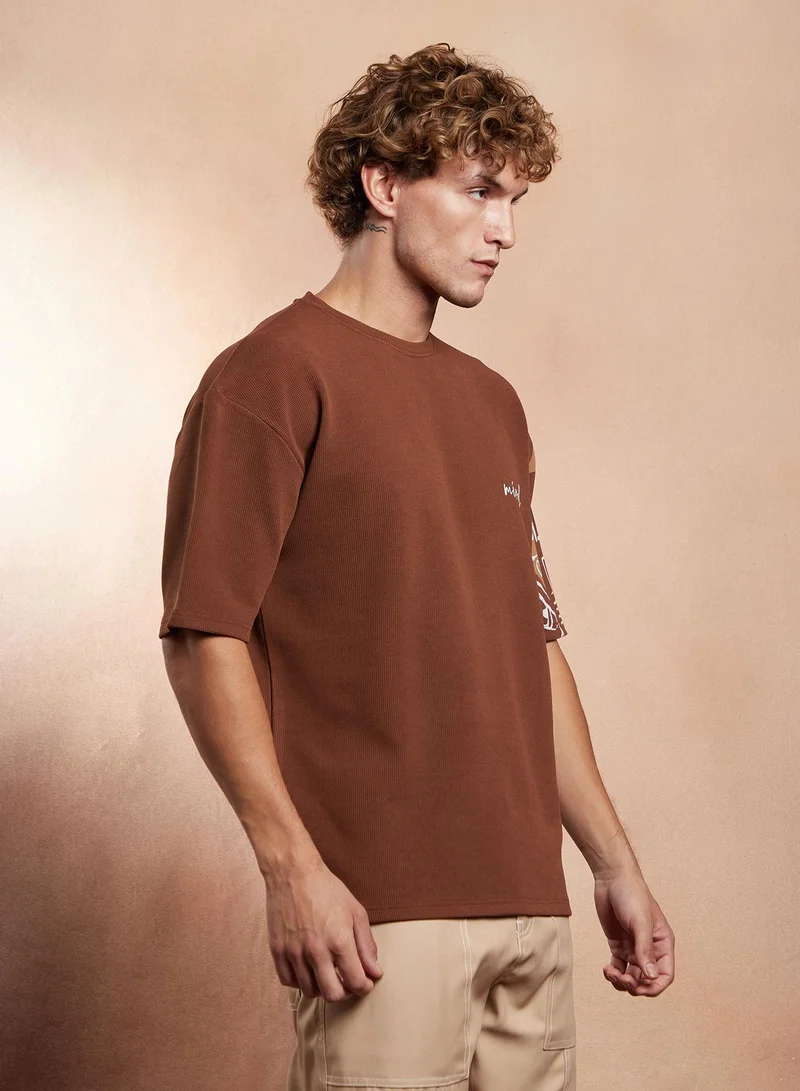 Campus Sutra Campus Sutra Men's Mocha Brown Boxy Folk-Wave T-Shirt For Casual Wear | Crew Neck | Short Regular Sleeves | Pull On Closure | T-Shirt Crafted With Comfort Fit For Everyday Wear