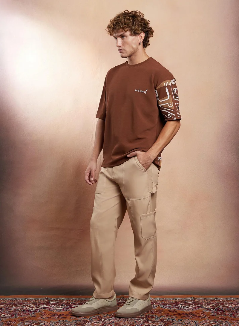 Campus Sutra Campus Sutra Men's Mocha Brown Boxy Folk-Wave T-Shirt For Casual Wear | Crew Neck | Short Regular Sleeves | Pull On Closure | T-Shirt Crafted With Comfort Fit For Everyday Wear