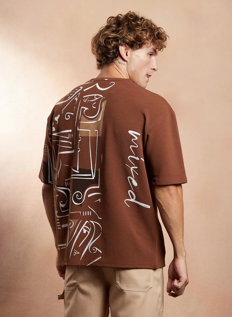 Campus Sutra Campus Sutra Men's Mocha Brown Boxy Folk-Wave T-Shirt For Casual Wear | Crew Neck | Short Regular Sleeves | Pull On Closure | T-Shirt Crafted With Comfort Fit For Everyday Wear