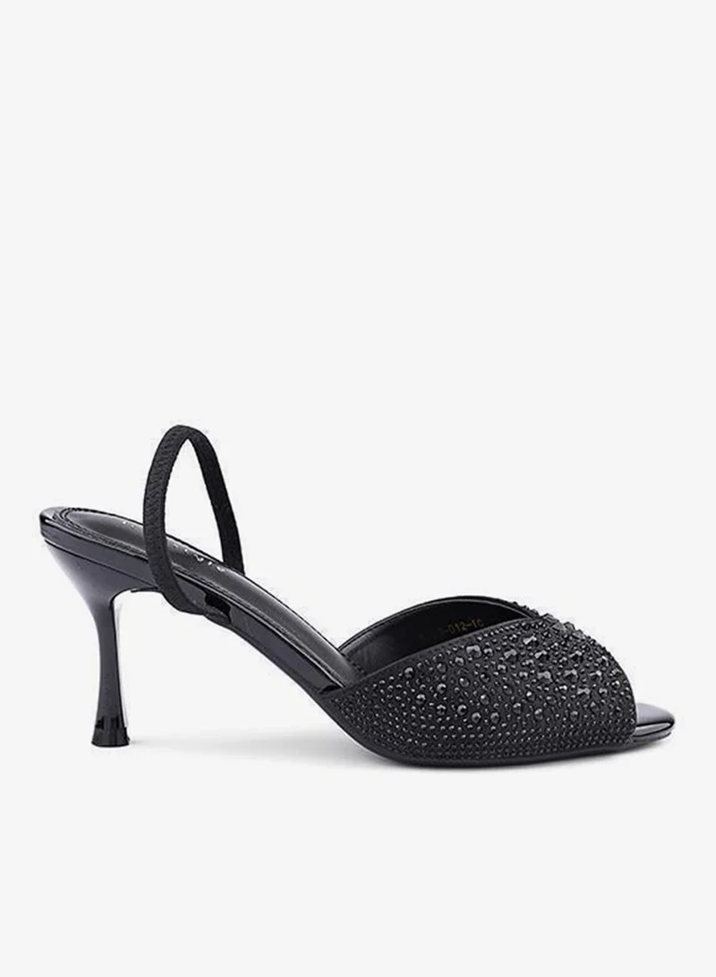 أيقون صنادل بكعب مزينة بأشرطة