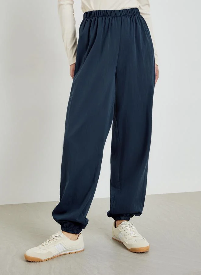 Styli Women Dark Blue Woven Wide Leg Joggers