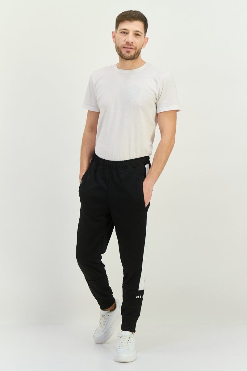Nike Men Standard Fit Brand Logo Outdoor Sweatpants, Black - Image 4