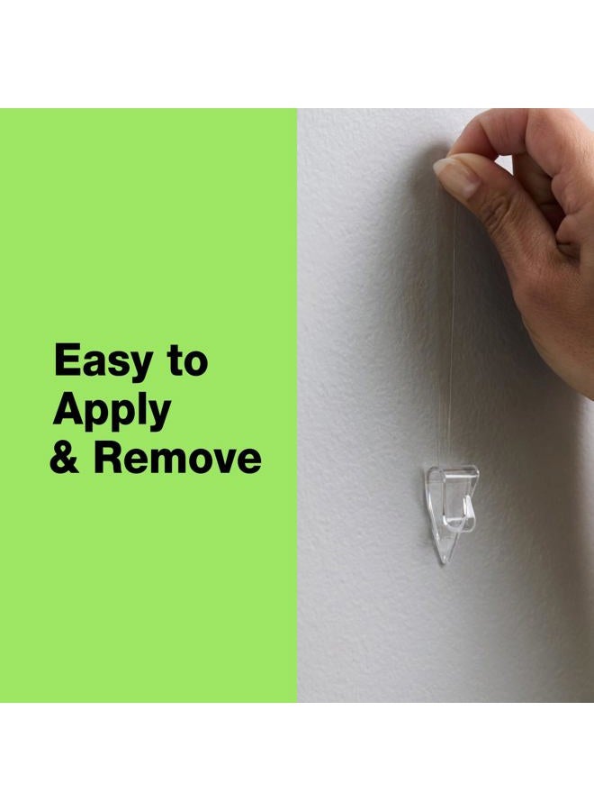 FrogTape reMOVEables Mini Adhesive Hooks for Hanging - Indoor Clips for Lights, Keys, Wires, Holiday Decor - No Damage - Removable & Reusable - 18 Hooks & 24 Adhesive Strips - Clear (Pack of 18) - Image 3