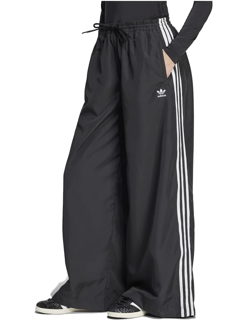 اديداس اوريجينالز Leopard Firebird Oversized Sweatpants