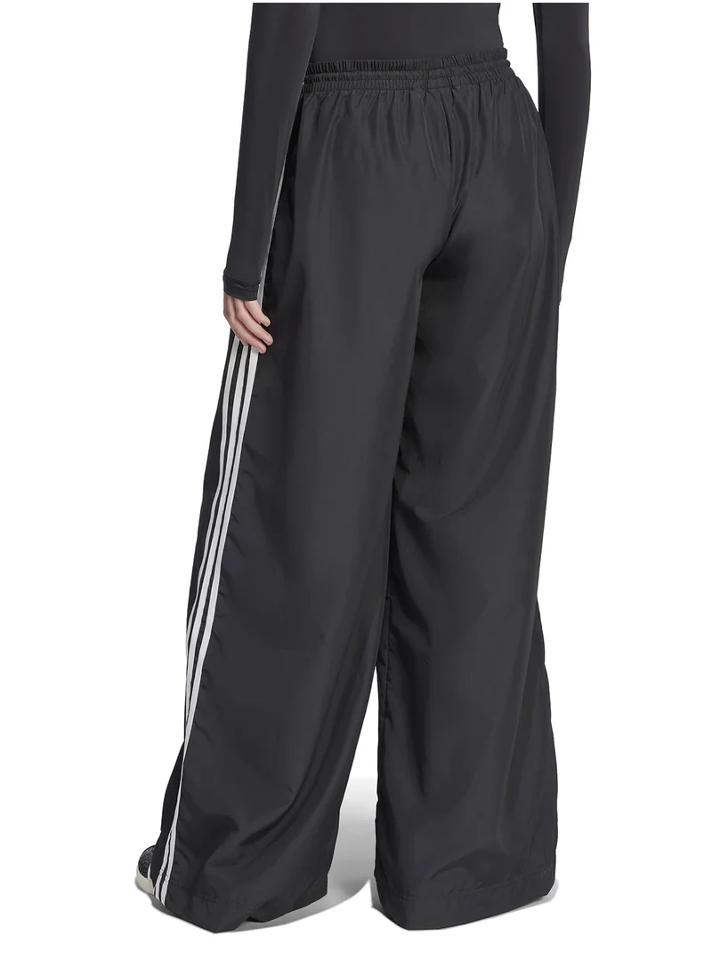 اديداس اوريجينالز Leopard Firebird Oversized Sweatpants