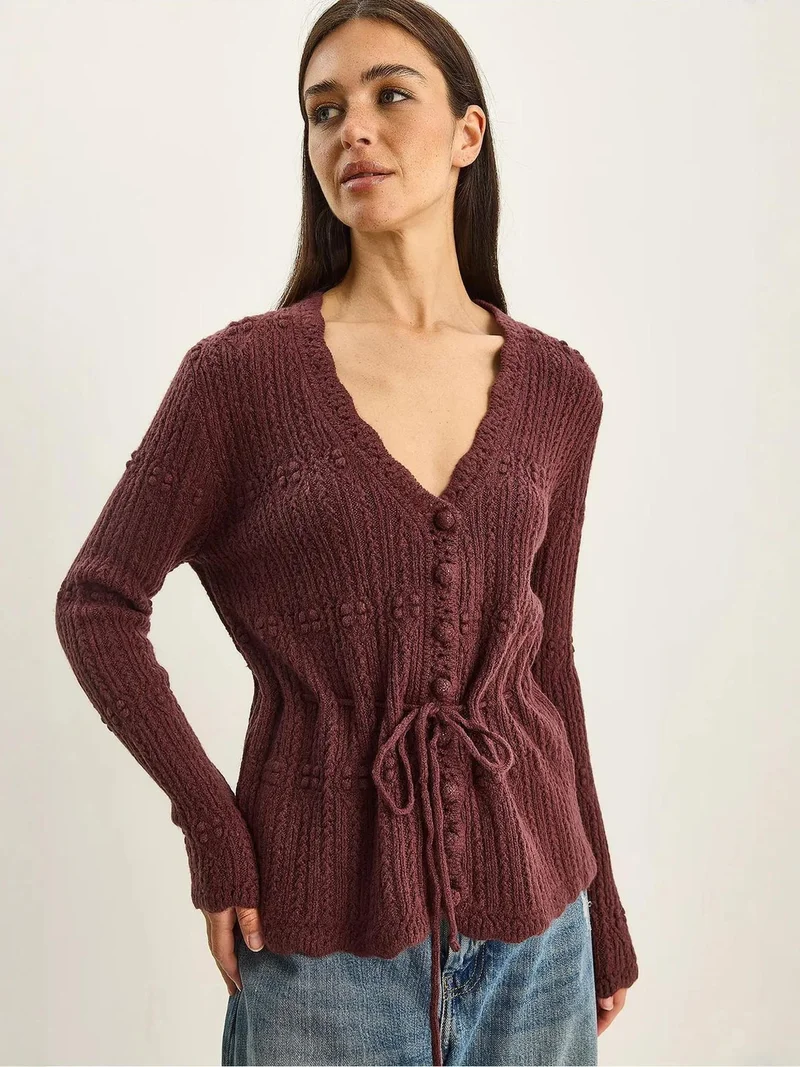 بيانكو لوتشي كارديجان بأزرار ورقبة على شكل حرف  ومضلع من لوتشي