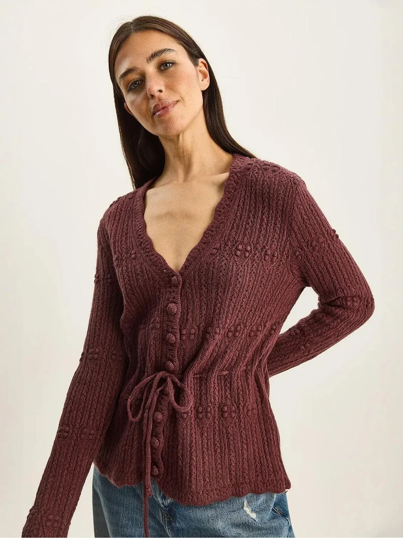 بيانكو لوتشي كارديجان بأزرار ورقبة على شكل حرف  ومضلع من لوتشي