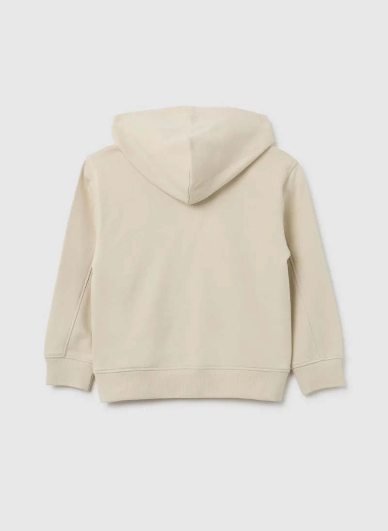 او في اس بلوزة قطنية للأطفال بلون بيج بقصة عادية