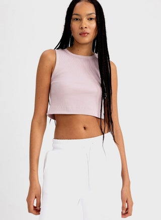 Woman Sleeveless Slim Fit Knitted Tank Top - pzsku/Z81975779C55E1DD5462EZ/45/1746747203/7978a23f-6817-4172-8aaf-e9fdbb553eef