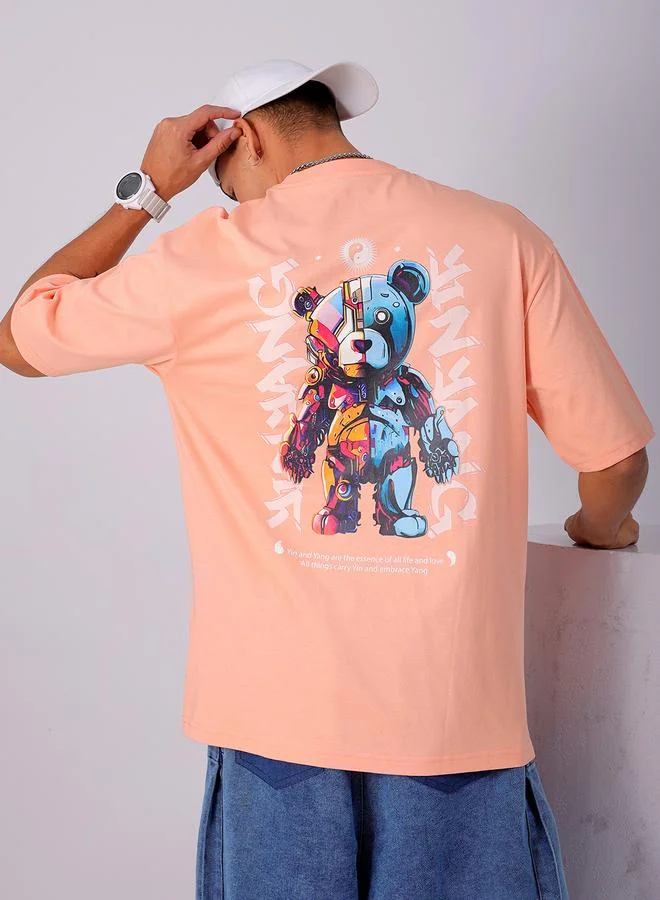 شركة المرآب الهندية تيشيرت واسع بطبعة جرافيك بلون خوخي